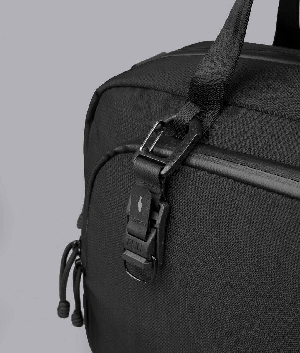 Close view of a Maglockz buckle on the Bravo Brief 14 shoulder strap