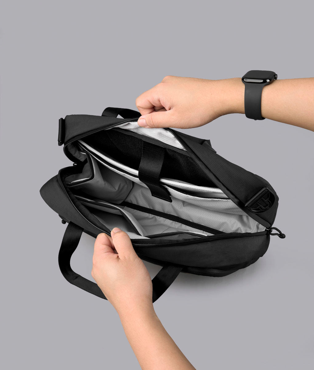 Black Bravo Brief 14 open to show its main compartment
