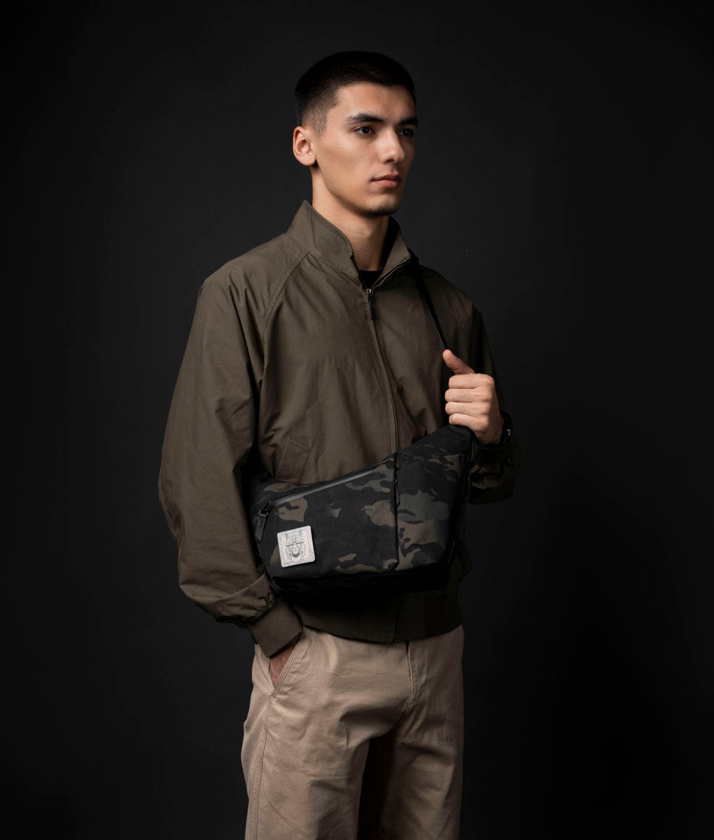 The ClogTwo Edition 4L worn crossbody in Multicam Black