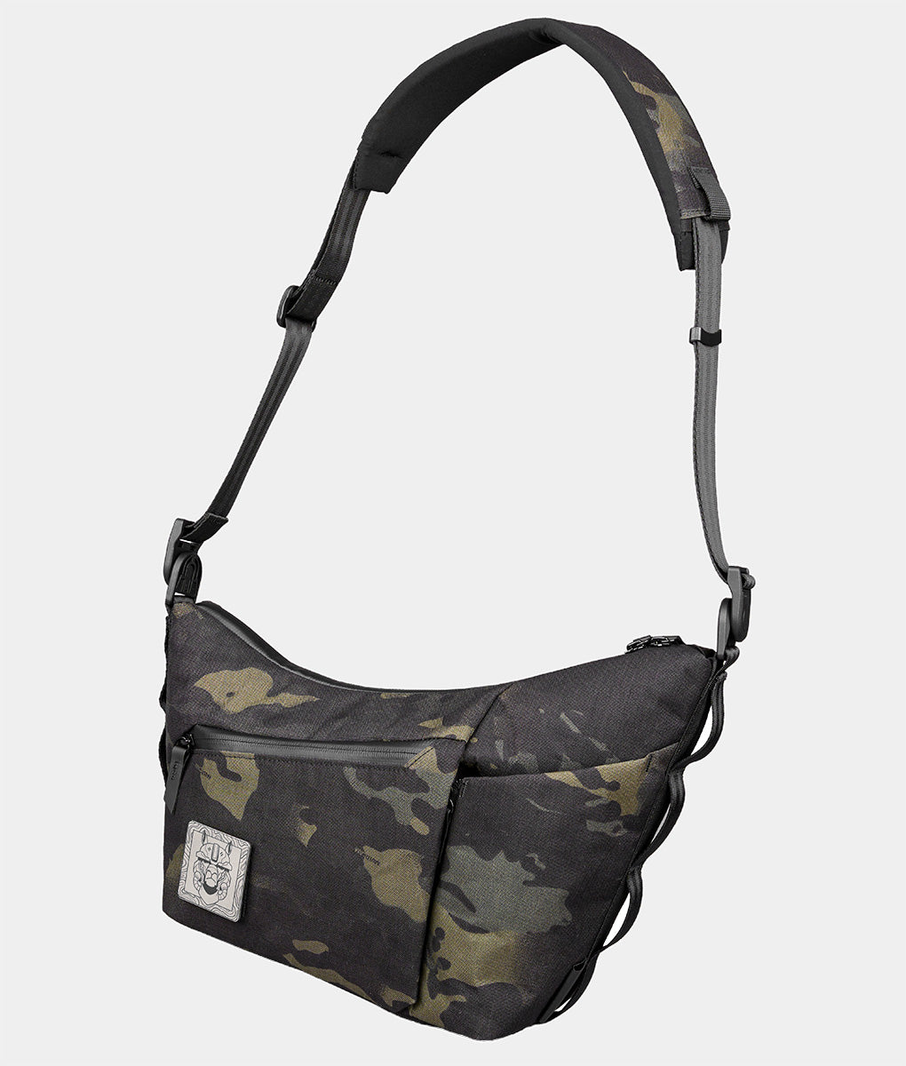 The ClogTwo Edition 4L in X-Pac X50 Multicam Black with its padded strap laid out
