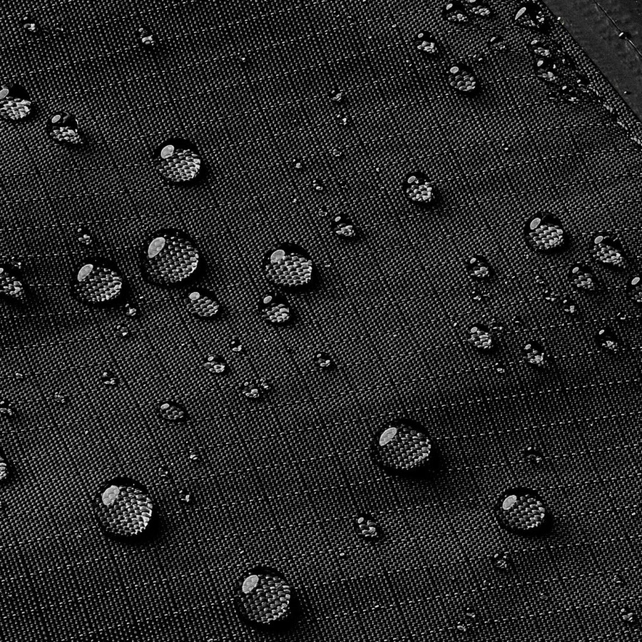 Water beading on the weather-resistant black fabric used for the Flow Satchel
